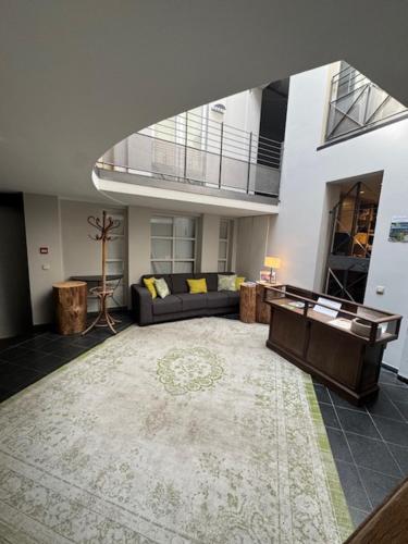 Posezení v ubytování Hotel Côté Cour