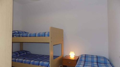 Postel nebo postele na pokoji v ubytování Apartment in Eraclea Mare 25654