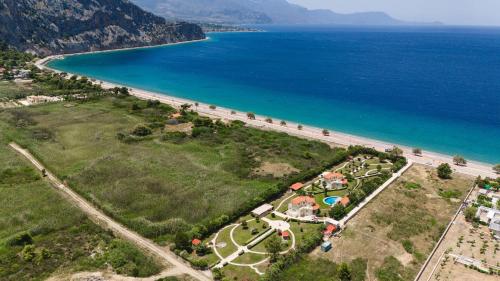 an aerial view of a beach and the ocean at Psatha Villa's in Psatha