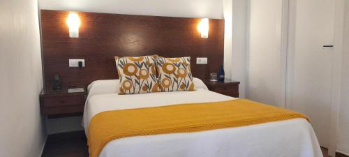 Katil atau katil-katil dalam bilik di Hotel Los Olivos