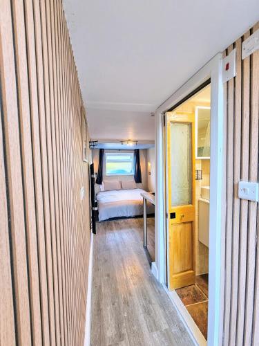 Ένα ή περισσότερα κρεβάτια σε δωμάτιο στο Rooms FG