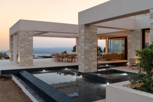 an image of a house with a swimming pool at Seanatra Luxury Villas in Ferma