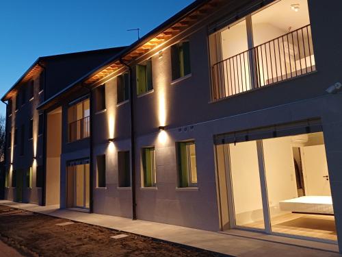 a building with large windows on the side of it at Ca' Allegra in Mogliano Veneto