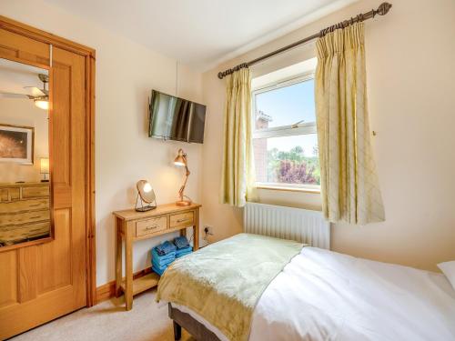 Postel nebo postele na pokoji v ubytování Welton House
