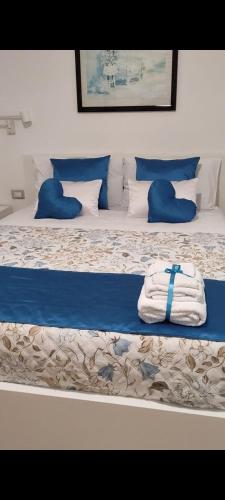 Кровать или кровати в номере La Maison