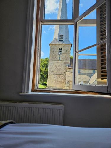 Ένα ή περισσότερα κρεβάτια σε δωμάτιο στο Kings Arms pub