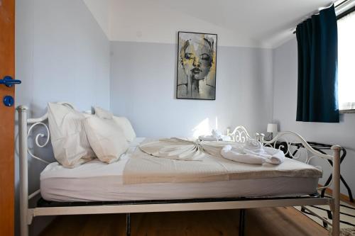 Ένα ή περισσότερα κρεβάτια σε δωμάτιο στο Casa di Gelsomino