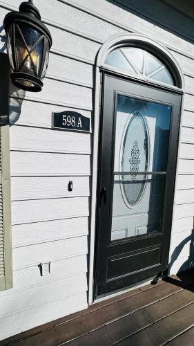 a door to a house with a wreath on it at Stunning duplex in Murrells Inlet A in Myrtle Beach