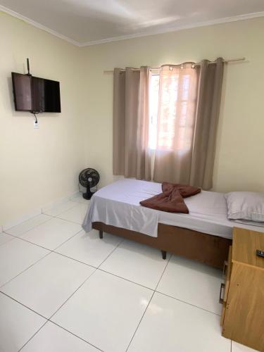 Postel nebo postele na pokoji v ubytování Hotel Alameda Bauru
