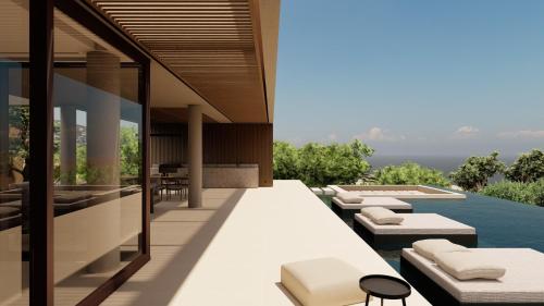 an image of a house with a swimming pool at Seanatra Luxury Villas in Ferma