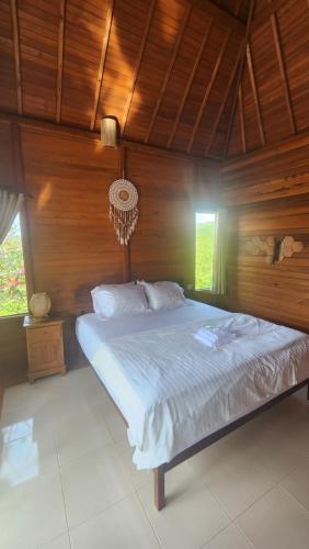 Postel nebo postele na pokoji v ubytování Nora Cottage