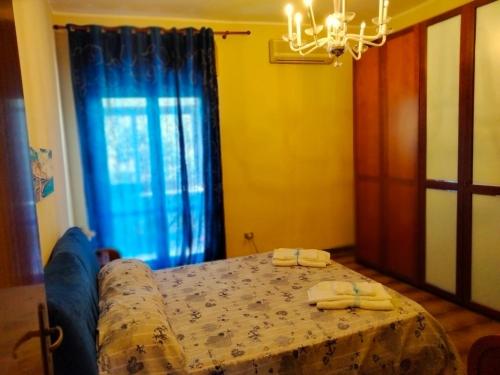 Ένα ή περισσότερα κρεβάτια σε δωμάτιο στο Mama's House