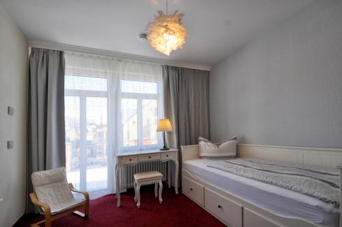 Postel nebo postele na pokoji v ubytování Dampfschiffhotel