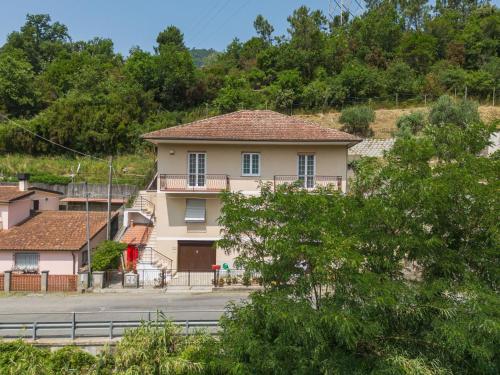 a house on the side of a road at Apartment Titta by Interhome in Casarza Ligure