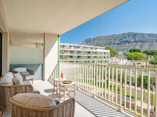 a balcony with a view of the mountains at Holiday Home Nerva by Interhome in Denia