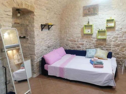 a room with a bed and a couch in it at Studio in Giovinazzo - Apulien 54437 in Giovinazzo