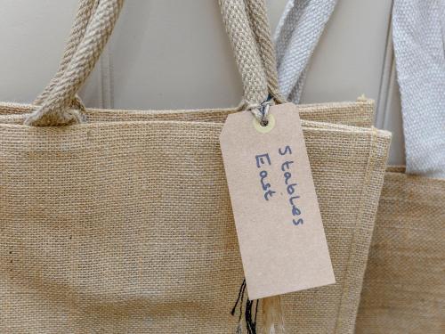 a bag with a tag on the side of it at Castlemans Stables East in Sedlescombe