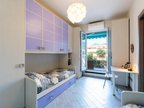 Apartment La dimora del pontile by Interhomeにあるベッド
