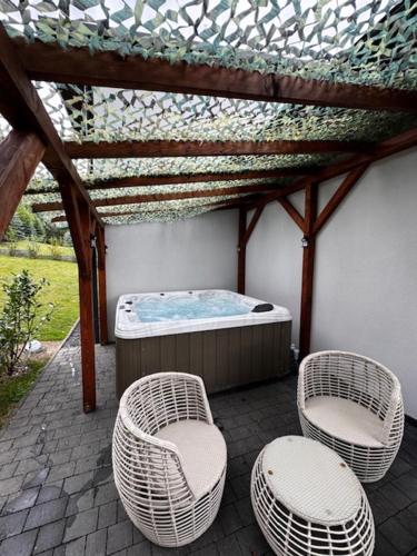 Photo de la galerie de l'établissement Domki&Apartamenty Koszarka, à Gródek nad Dunajcem