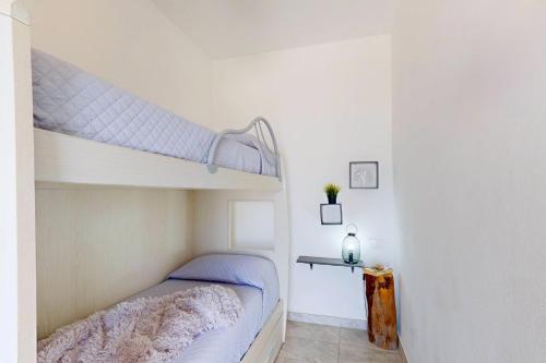 a bedroom with a bunk bed in a room at Antico Borgo dei Templi in Agrigento