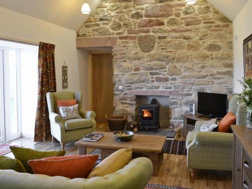 Posezení v ubytování Paterson Cottage