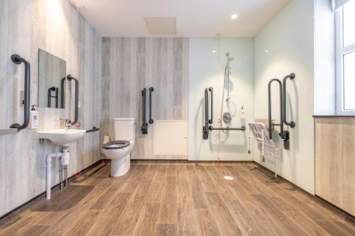 a bathroom with a toilet and a sink at easyHotel Belfast in Belfast