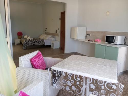 Kuchyň nebo kuchyňský kout v ubytování Hotel Acapulco sul mare