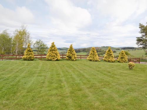 Jardín al aire libre en Ashknowe Log Cabin - S4590