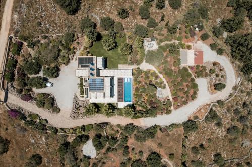 an aerial view of a house with a yard at BlueSkyline Owner's Listing, By Hellocrete in Chania Town