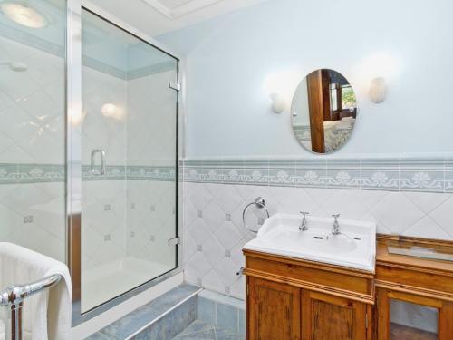a bathroom with a sink and a shower at Dess Lodge in Kincardine OʼNeil
