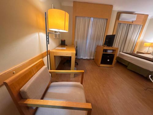 Katil atau katil-katil dalam bilik di Lindo Flat ao Lado do Aeroporto de Congonhas