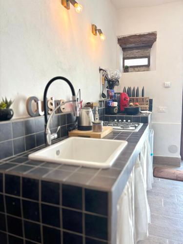 Kuchyň nebo kuchyňský kout v ubytování Free Parking - La Corte House 55