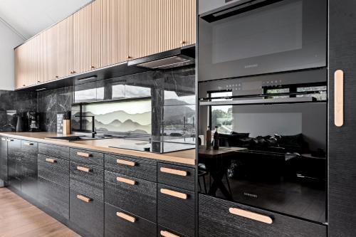 Η κουζίνα ή μικρή κουζίνα στο Modern gem at Hafslovatnet