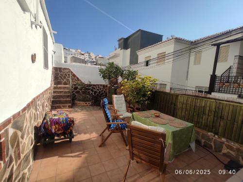 Acogedora Casa Familiar con Patioにあるバルコニーまたはテラス
