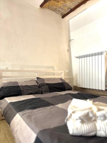 Postel nebo postele na pokoji v ubytování Free Parking - La Corte House 55