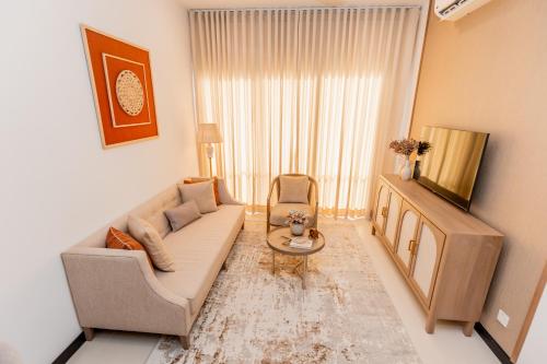 TV a/nebo společenská místnost v ubytování Colombo Trizen Apartments by Pinnacle