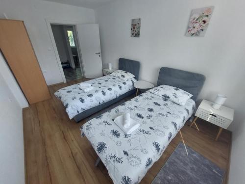 Cama o camas de una habitación en Apartman "MEDENI"