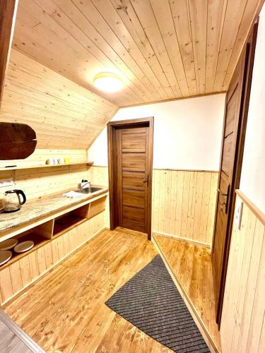 Una cama o camas en una habitación de Na Mlejně
