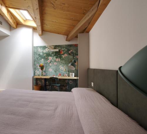 Postel nebo postele na pokoji v ubytování Corte Palù
