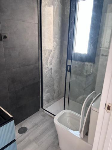 Koupelna v ubytování Excelentes apartamentos a 200 metros de la playa