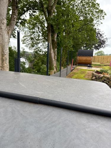 a black object on the top of a table at The Fishermans Rest in Castle Douglas