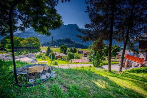 a park with a skate park with mountains in the background at Chalet 6 personnes avec sauna in Leysin