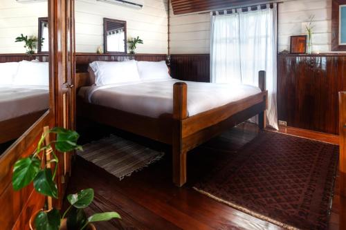 Casa Acuario Boutique Hotelにあるベッド