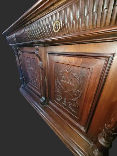 a wooden cabinet with a carving on it at Hotel Boutique Premium Exclusivo in Paine