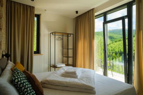 Кровать или кровати в номере Chalet Panorama (Апартаменти)