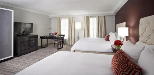 Ein Bett oder Betten in einem Zimmer der Unterkunft The Graham Georgetown