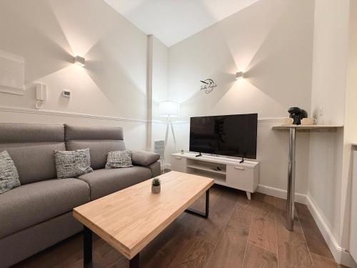 Apartamentos Mk77 León Zuloagaにあるテレビまたはエンターテインメントセンター