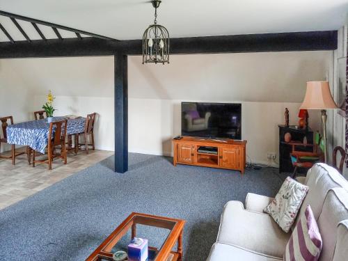 Et tv og/eller underholdning på Greenwood Cottage