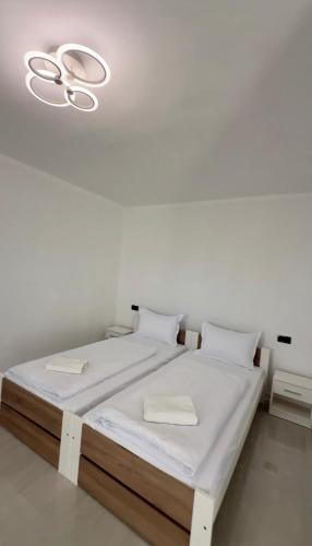 Postel nebo postele na pokoji v ubytování Cabana Vărad Coronini
