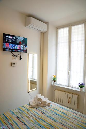 Katil atau katil-katil dalam bilik di Casa DELUXE -50m dal mare-